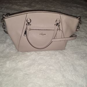 Coach prairie satchel in grey( has pinkish undertone)